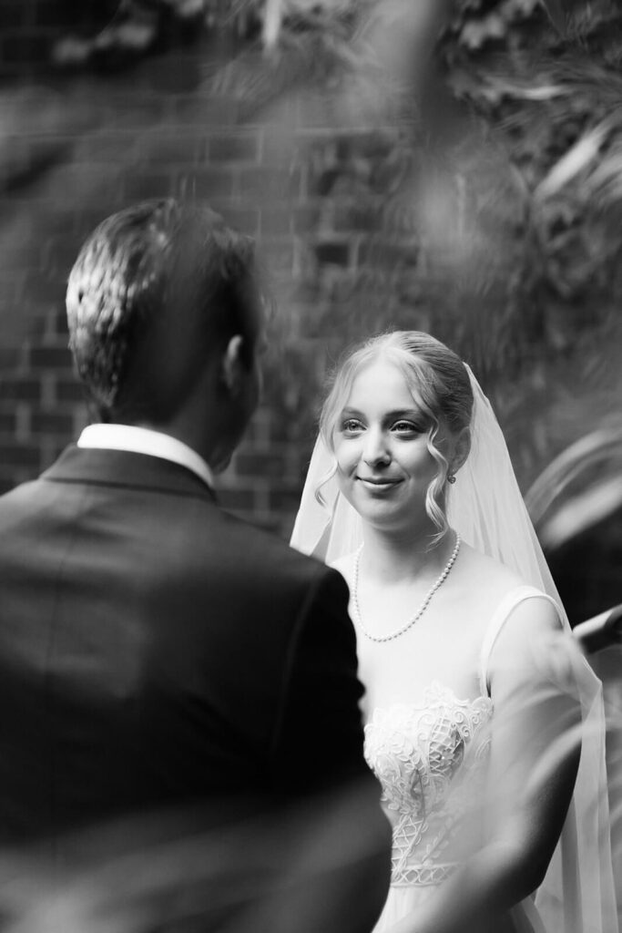 Backyard-style wedding ceremony in Frankies Spuntino's outdoor Garden space. Photo by OkCrowe Photography.