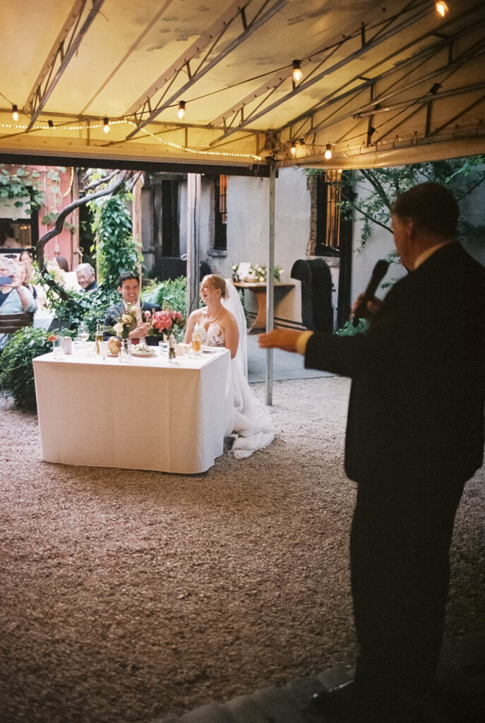 Dinner-only wedding reception in Frankies Spuntino's outdoor Garden & Stables. Photo by OkCrowe Photography.