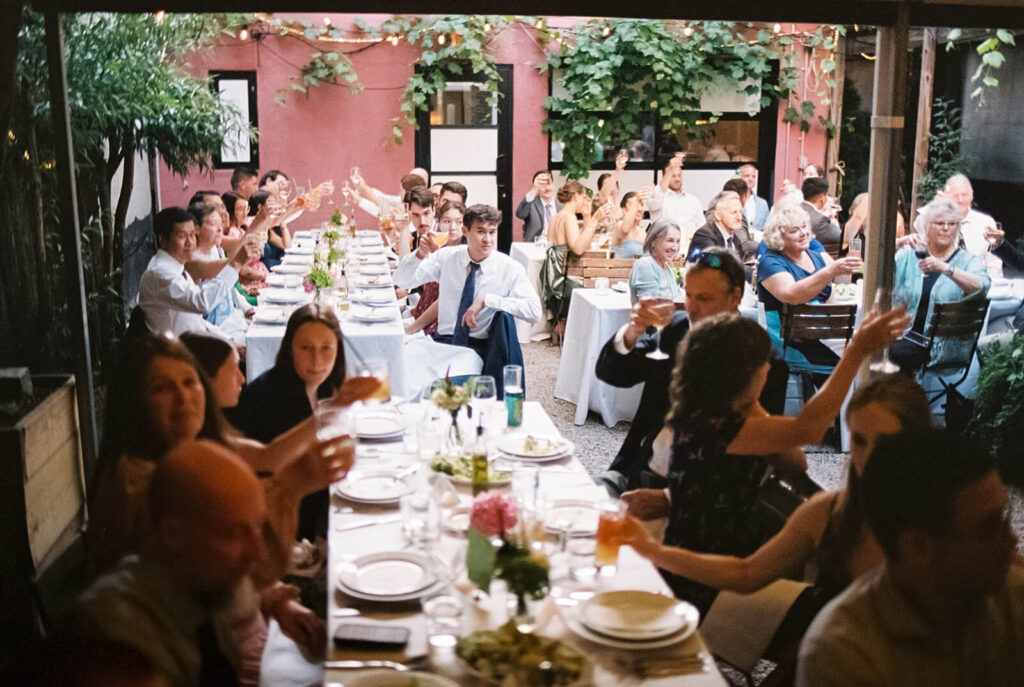 Dinner-only wedding reception in Frankies Spuntino's outdoor Garden & Stables. Photo by OkCrowe Photography.