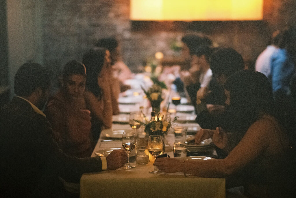 Dinner-only wedding reception in Frankies Spuntino's outdoor Garden & Stables. Photo by OkCrowe Photography.