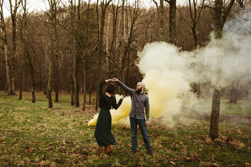 Example of smoke bombs used in an engagement session. Photo by OkCrowe Photography.