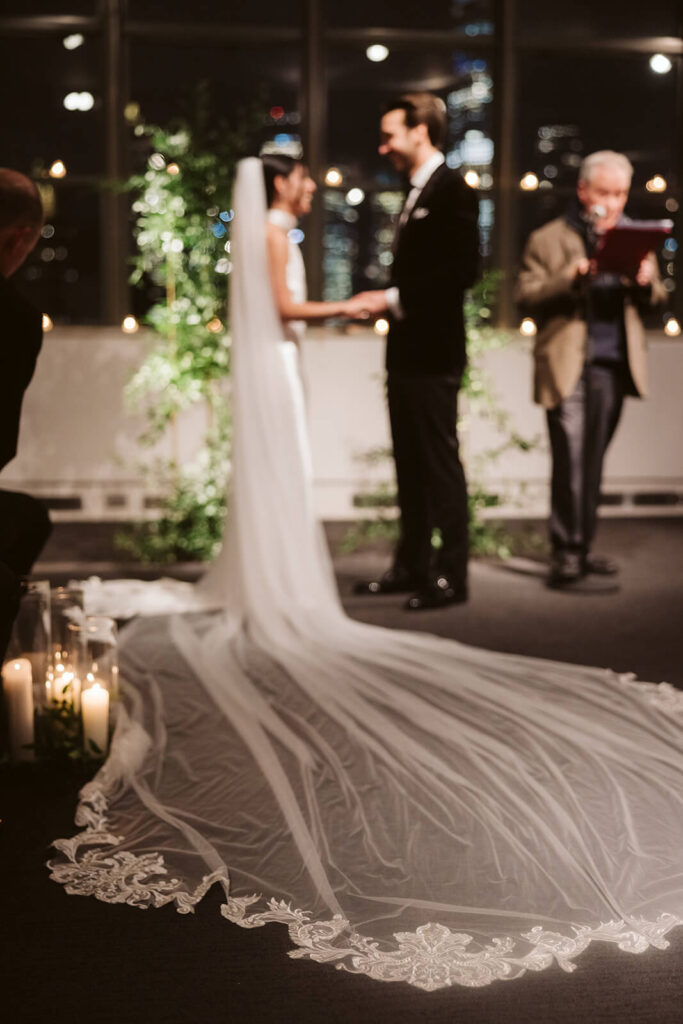 Wedding ceremony at Tribeca Rooftop & 360. Photo by OkCrowe Photography.