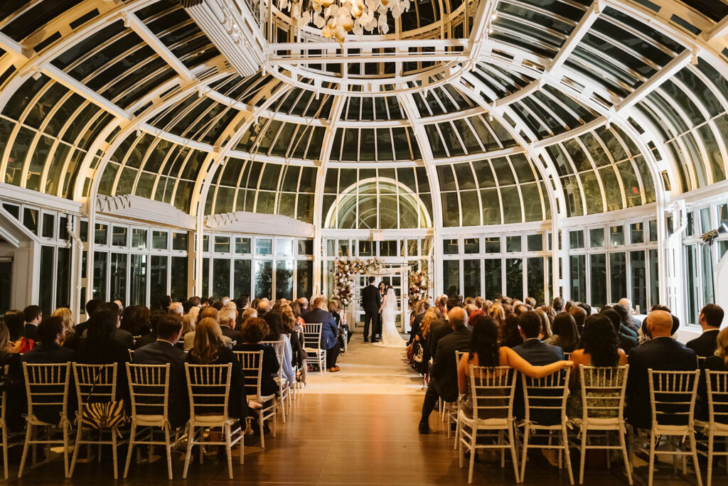 Wedding ceremony at the Brooklyn Botanic Garden in New York City. Photo by OkCrowe Photography.