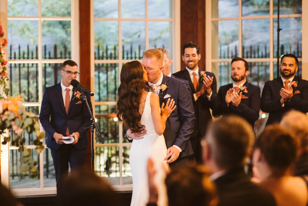 Wedding ceremony at the Central Park Boathouse in New York City. Photo by OkCrowe Photography.
