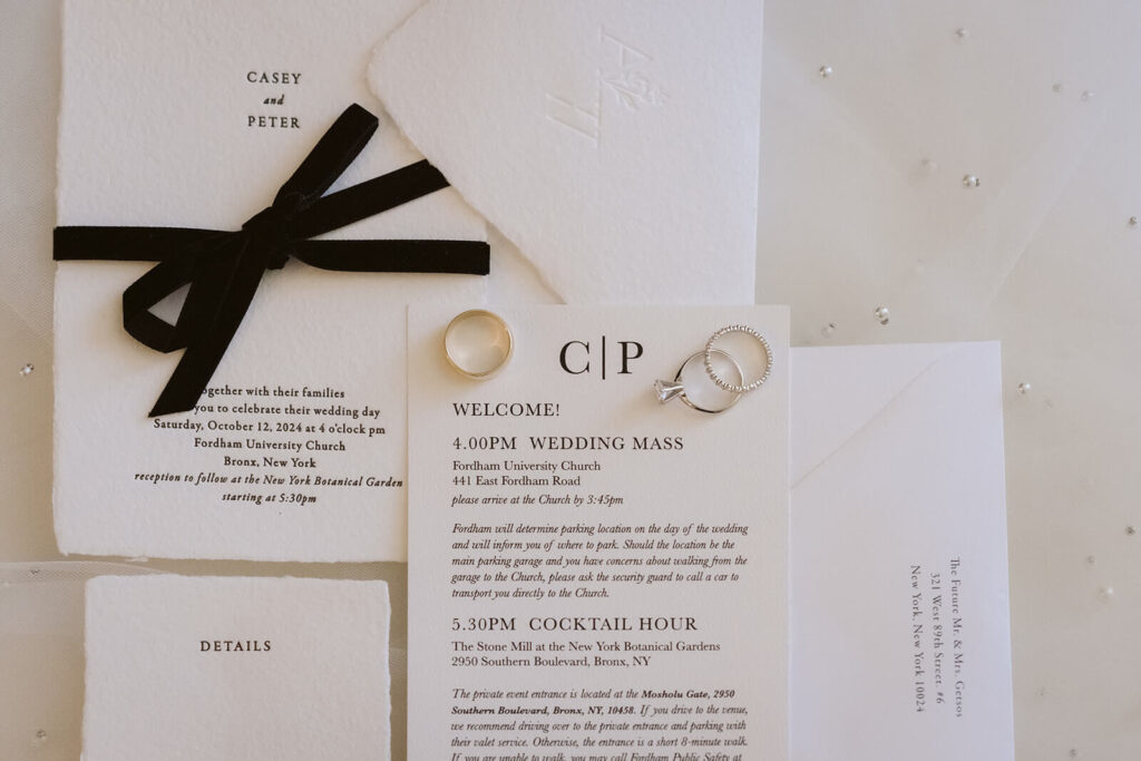 Wedding invitation flatlay for a wedding at the New York Botanical Gardens. Photo by OkCrowe Photography.
