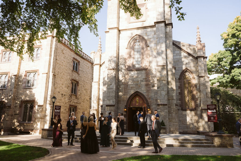 Outside of the Fordham University Church before a wedding ceremony. Photo by OkCrowe Photography.
