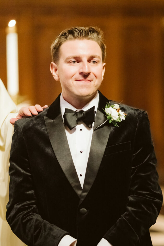 Wedding ceremony at the Fordham University Church. Photo by OkCrowe Photography.