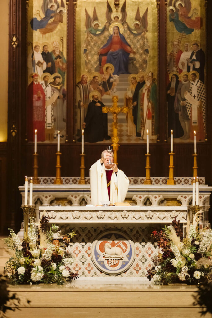 Wedding ceremony at the Fordham University Church. Photo by OkCrowe Photography.
