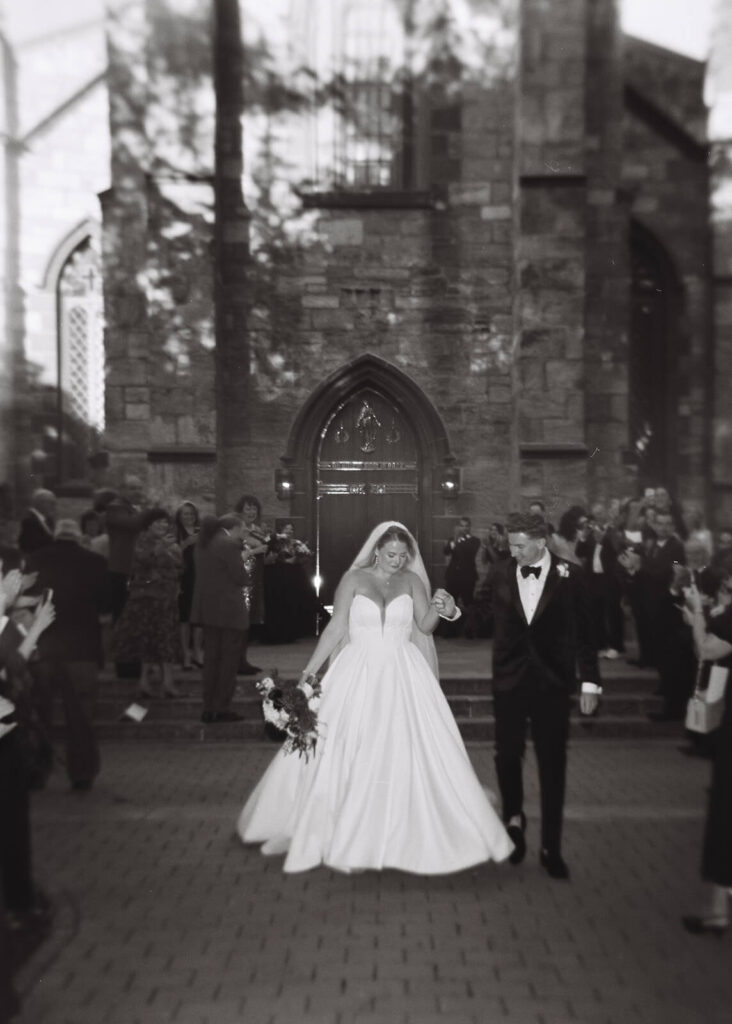 Wedding ceremony at the Fordham University Church. Photo by OkCrowe Photography.