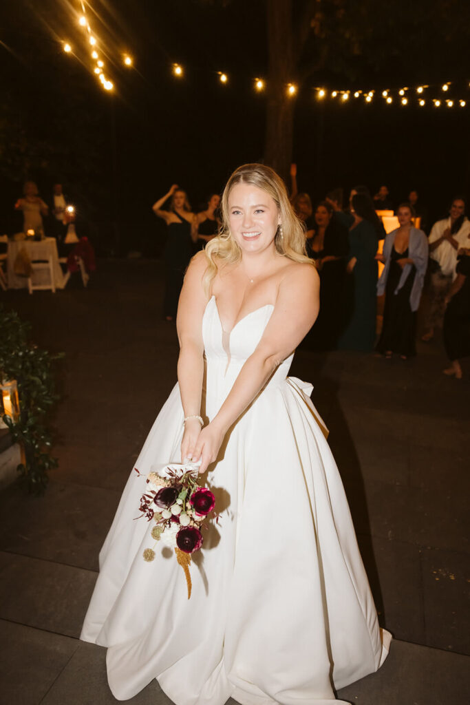 Dance floor of a wedding reception at the Stone Mill in the New York Botanical Gardens. Photo by OkCrowe Photography.