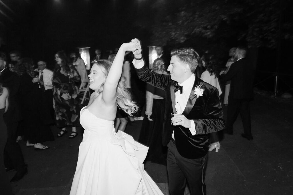 Dance floor of a wedding reception at the Stone Mill in the New York Botanical Gardens. Photo by OkCrowe Photography.