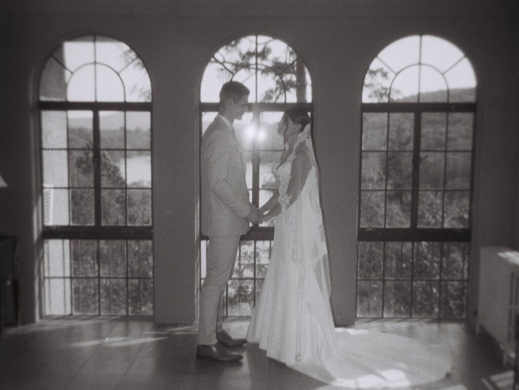 Bride and groom portraits in the mansion at Arrow Park. Photo by OkCrowe Photography.  
