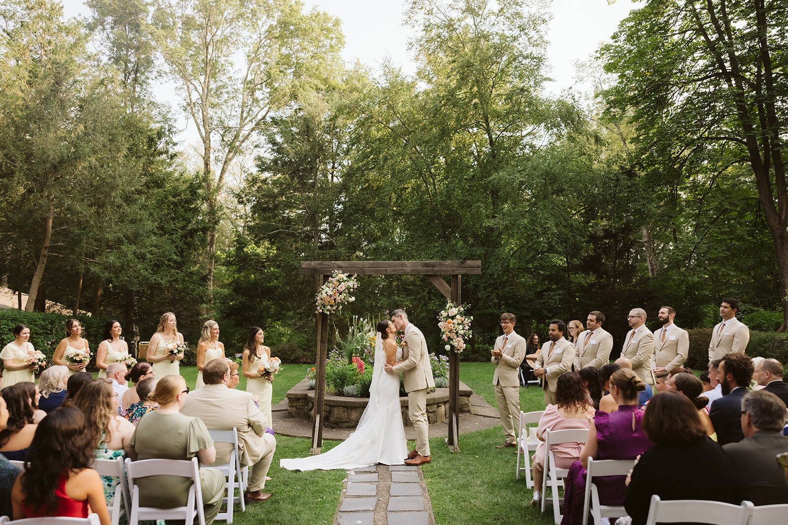 Wedding ceremony in Arrow Park's European-style garden. Photo by OkCrowe Photography.  