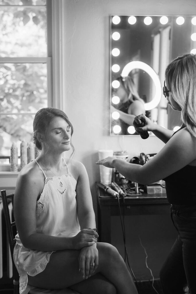 Bride getting ready in the bridal suite at Arrow Park. Photo by OkCrowe Photography.