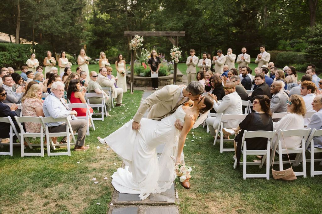 Wedding ceremony in Arrow Park's European-style garden. Photo by OkCrowe Photography.  