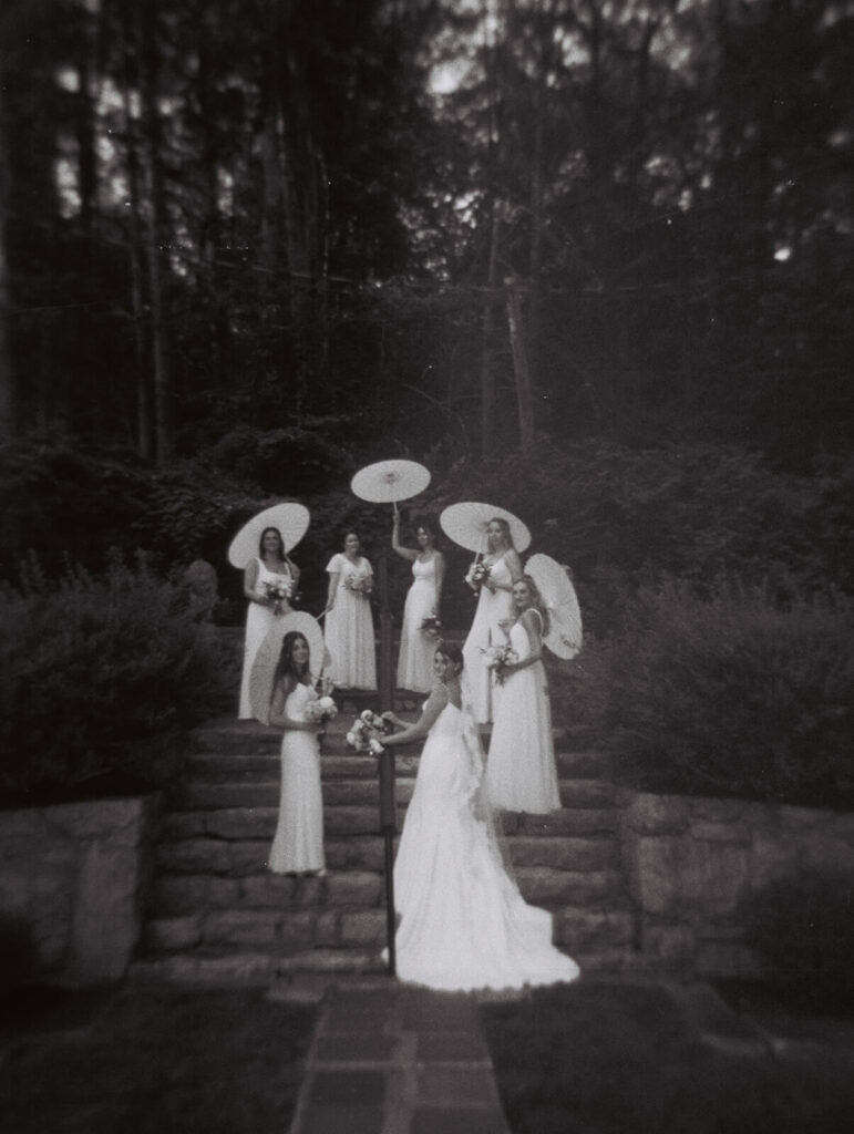 Vanity Fair-style wedding party photoshoot in Arrow Park's European-style garden. Photo by OkCrowe Photography.  