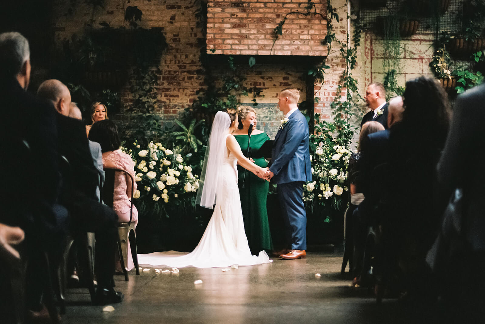 Wedding ceremony in the Brooklyn Winery. Photo by OkCrowe Photography. 