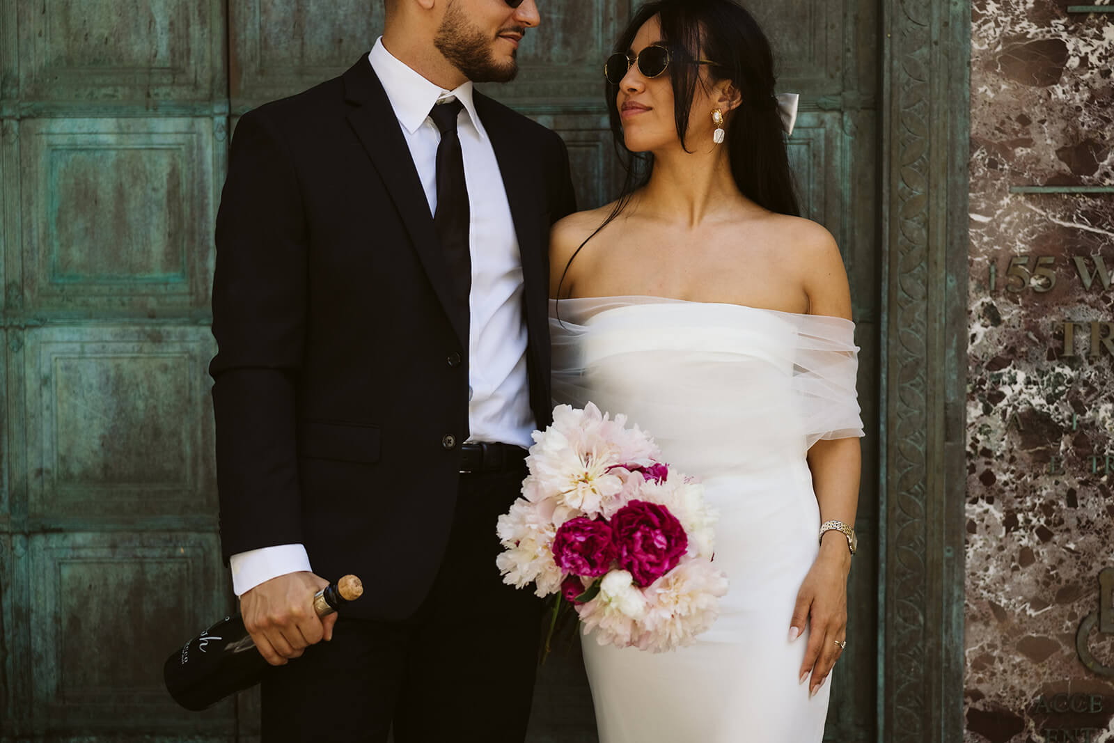 Newlywed photos in NYC's City Hall. Photo by OkCrowe Photography. 