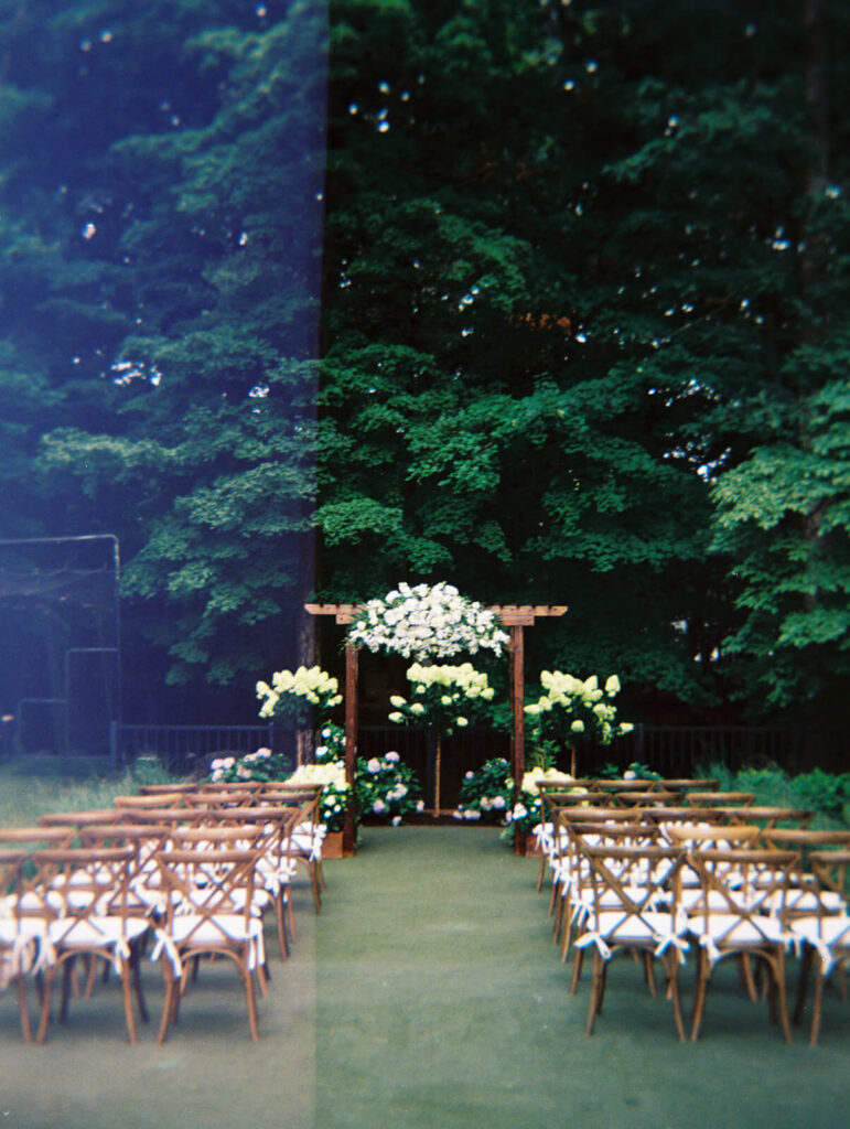 Wedding ceremony in bride's childhood home in Mahwah, NJ. Photo by OkCrowe Photography. 