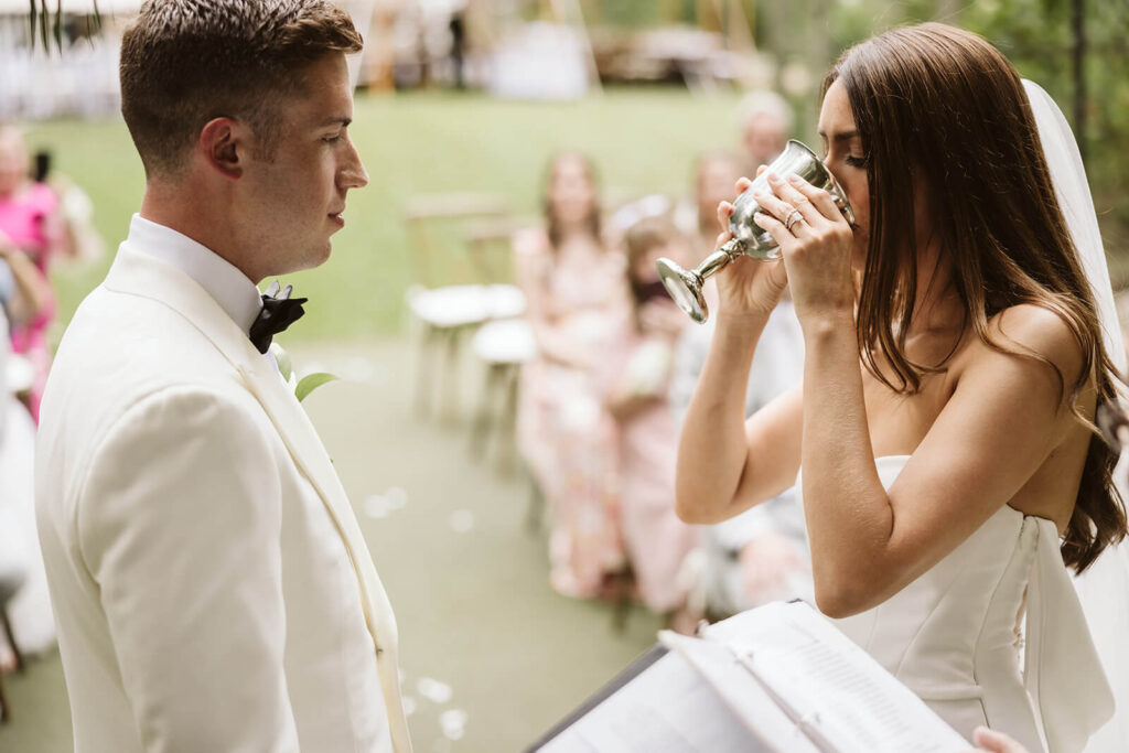 Wedding ceremony in bride's childhood home in Mahwah, NJ. Photo by OkCrowe Photography. 