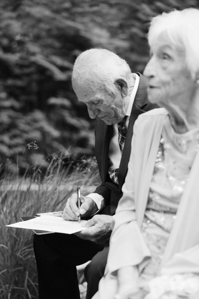 Wedding ceremony in bride's childhood home in Mahwah, NJ. Photo by OkCrowe Photography. 
