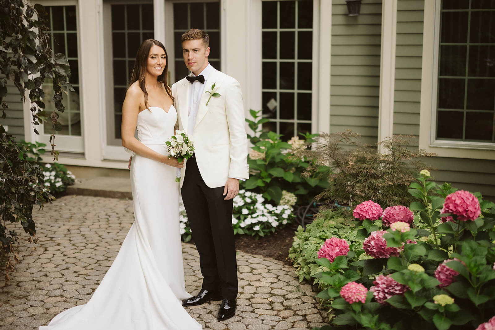 Newlywed photos around the bride's childhood home in Mahwah, NJ. Photo by OkCrowe Photography. 