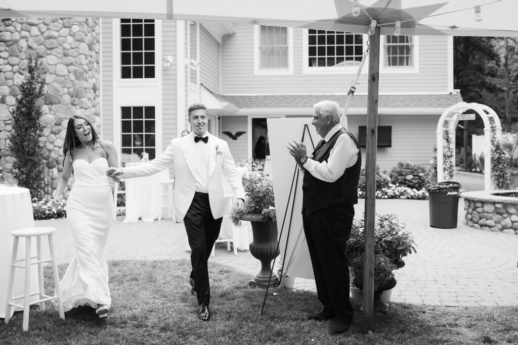 Wedding reception in the bride's parents' backyard in Mahwah, NJ. Photo by OkCrowe Photography. 