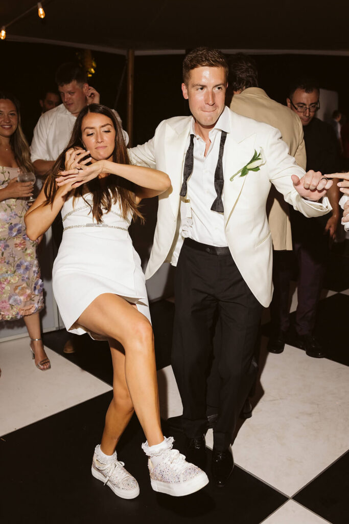 Wedding reception in the bride's parents' backyard in Mahwah, NJ. Photo by OkCrowe Photography. 