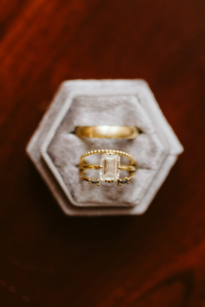 Wedding bands in a box. Photo by OkCrowe Photography. 