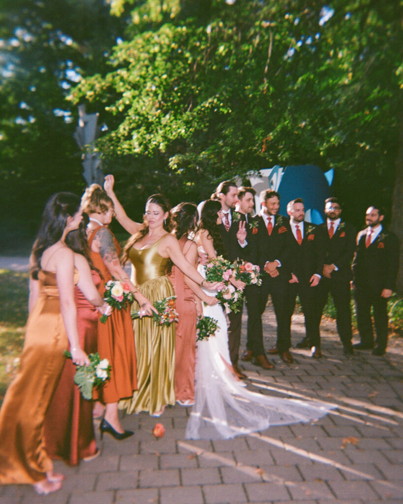 Wedding party portraits at the Grounds for Sculpture. Photo by OkCrowe Photography. 