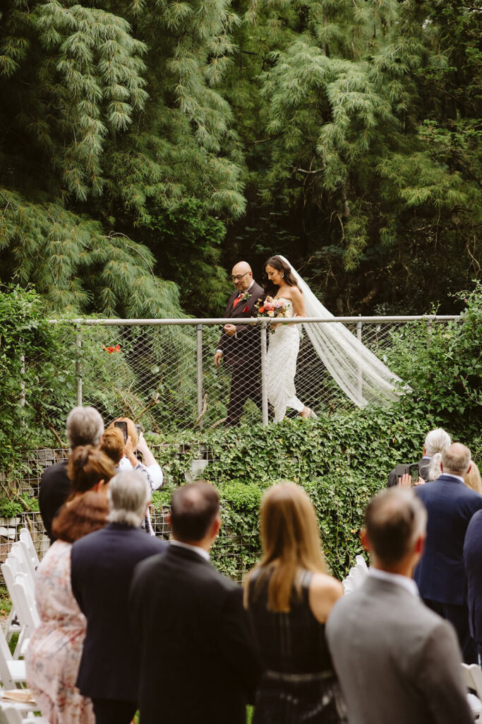 Wedding ceremony at the Grounds for Sculpture. Photo by OkCrowe Photography. 