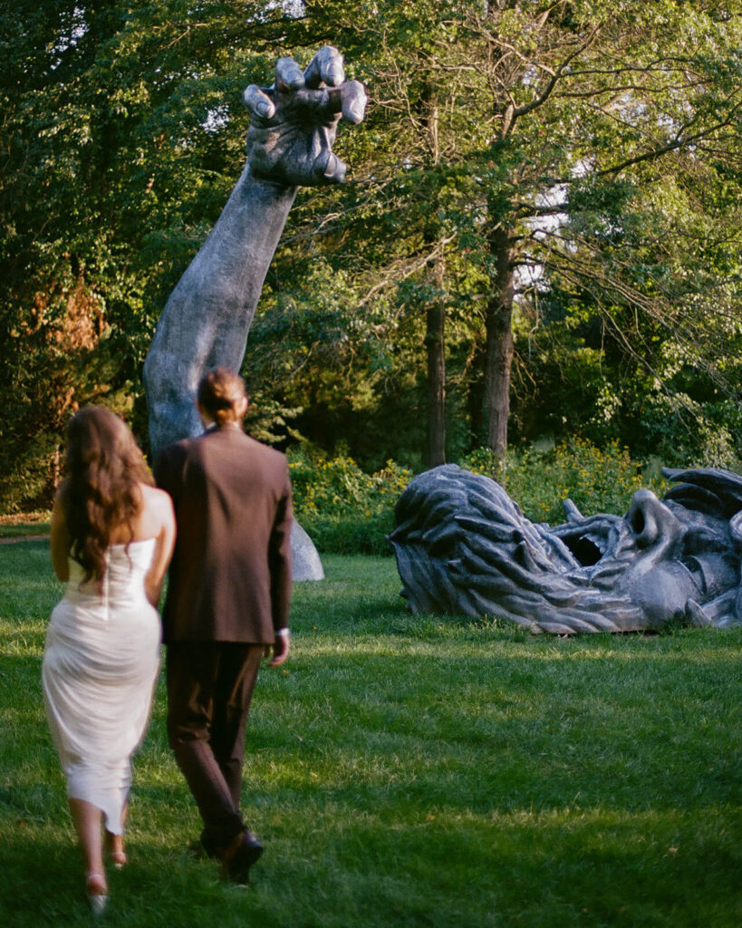 Newlywed portraits with the Awakening sculpture at the Grounds for Sculpture. Photo by OkCrowe Photography. 