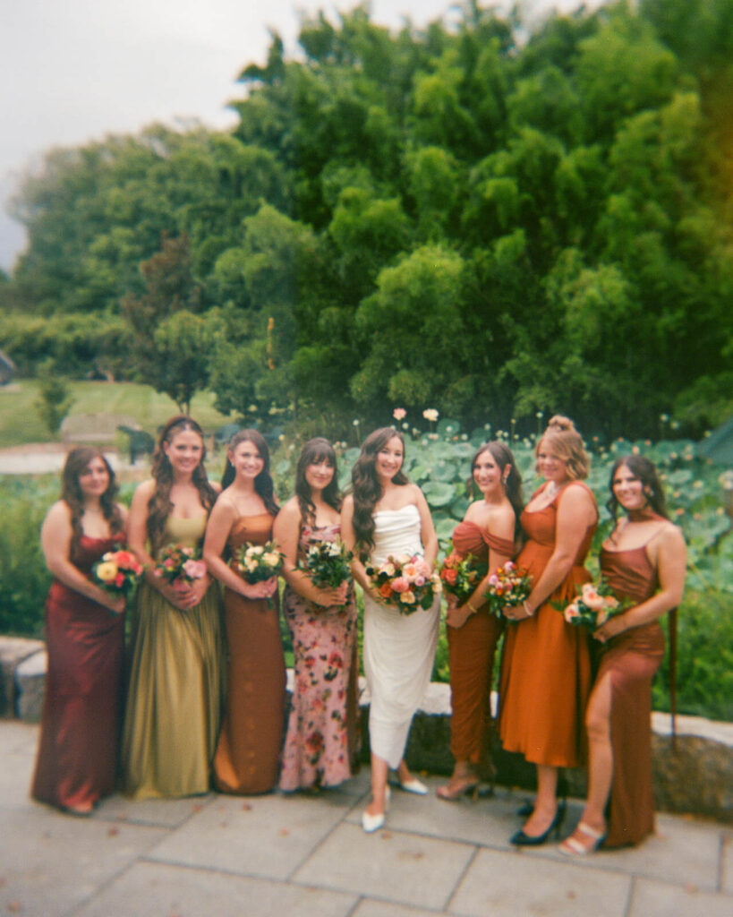 Bridal party portrait at Grounds for Sculpture. Photo by OkCrowe Photography. 