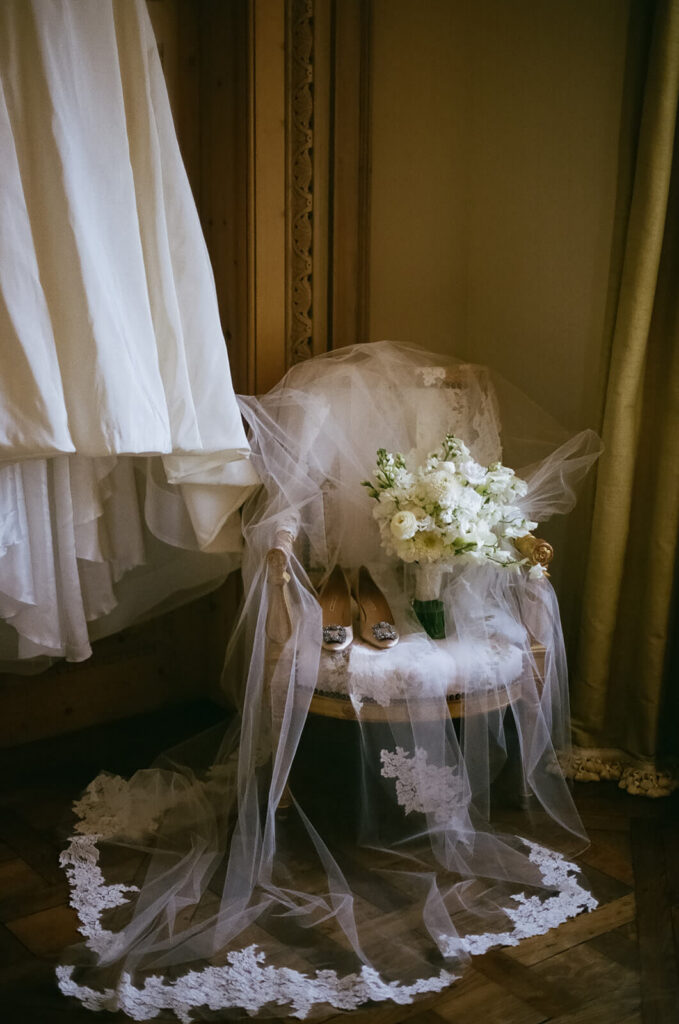 Bride's wedding dress and accessories in the TPC Jasna Polana Prince Albert Suite. Photo by OkCrowe Photography.