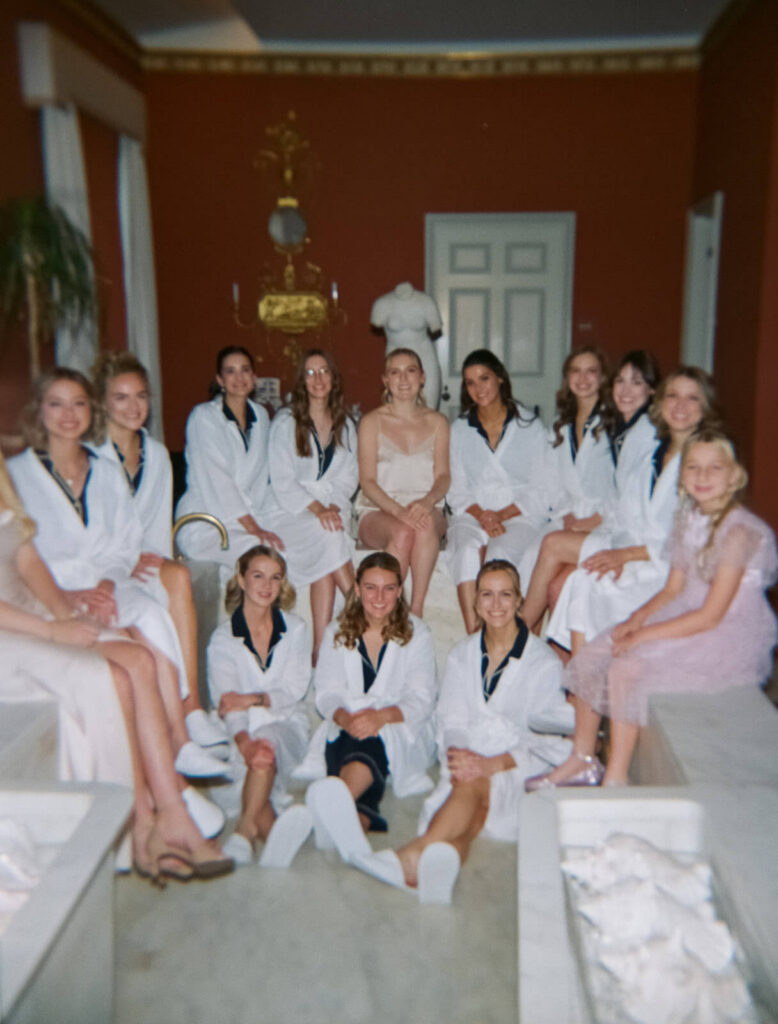 Bridal party getting ready portrait in the TPC Jasna Polana Prince Albert Suite. Photo by OkCrowe Photography.
