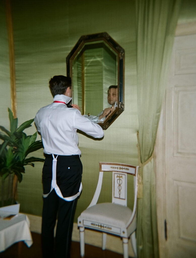Groom getting ready in the TPC Jasna Polana Prince Albert Suite. Photo by OkCrowe Photography.