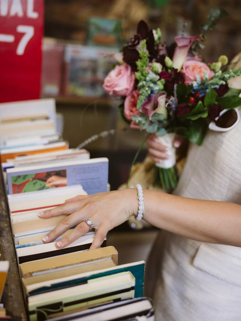 Newlyweds portraits at the Strand Bookstore after their courthouse ceremony at the NYC Courthouse. Photo by OkCrowe Photography.