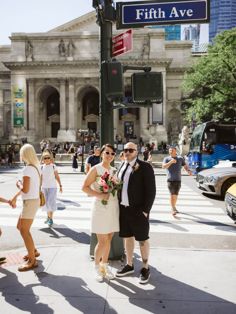 Newlyweds portraits at the New York Public LIbrary after their courthouse ceremony at the NYC Courthouse. Photo by OkCrowe Photography.