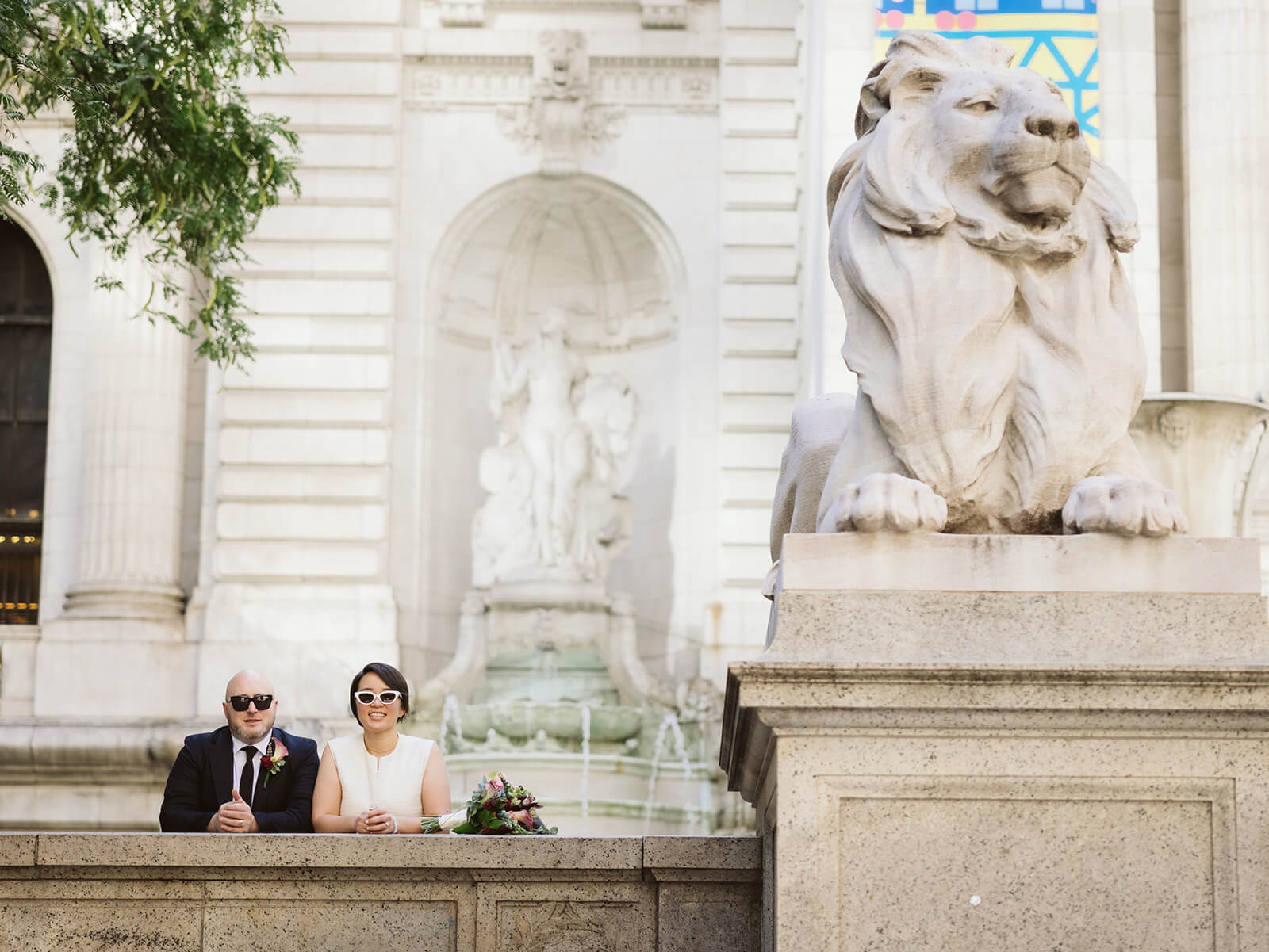 Newlyweds portraits at the New York Public Library after their courthouse ceremony at the NYC Courthouse. Photo by OkCrowe Photography.
