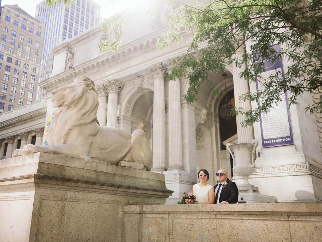 Newlyweds portraits at the New York Public Library after their courthouse ceremony at the NYC Courthouse. Photo by OkCrowe Photography.