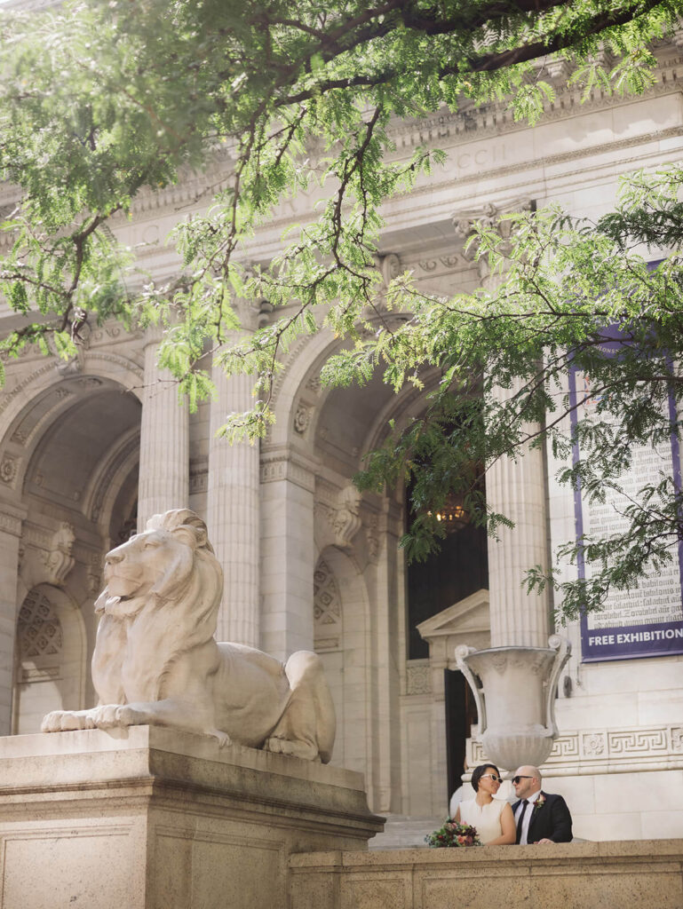 Newlyweds portraits at the New York Public Library after their courthouse ceremony at the NYC Courthouse. Photo by OkCrowe Photography.