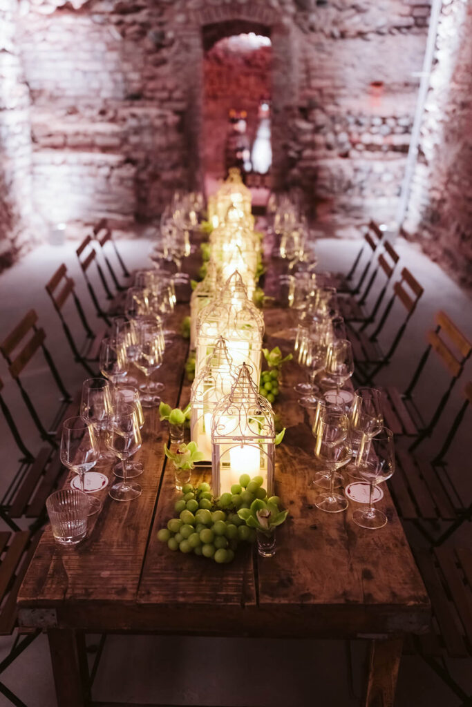 Wine tasting in the dungeon of Castello Visconteo. Photography by OkCrowe Photography.  