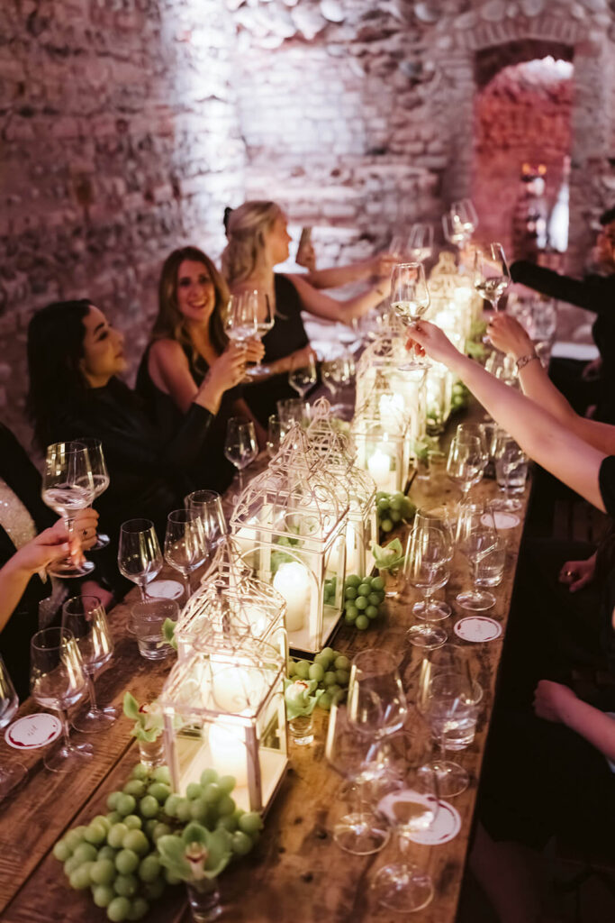 Wine tasting in the dungeon of Castello Visconteo. Photography by OkCrowe Photography.  