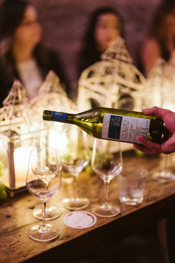 Wine tasting in the dungeon of Castello Visconteo. Photography by OkCrowe Photography.  