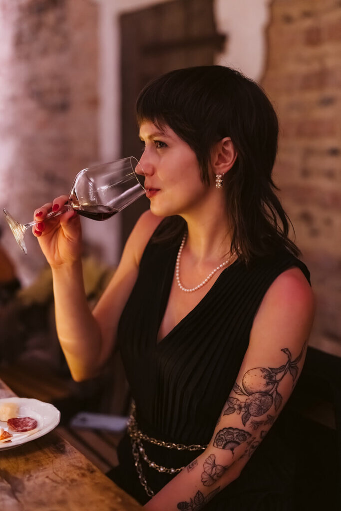 Wine tasting in the dungeon of Castello Visconteo. Photography by OkCrowe Photography.  