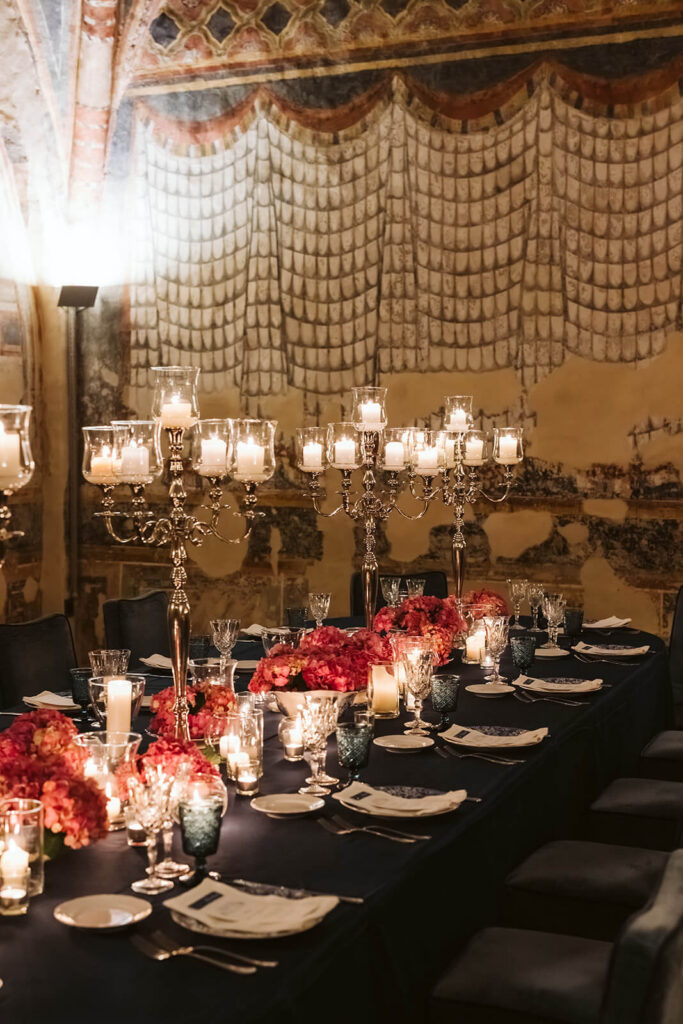 Formal gala dinner in the Beatrice d'Este Sforza Hall also known as the Throne Room at Castello Visconteo. Photography by OkCrowe Photography.  