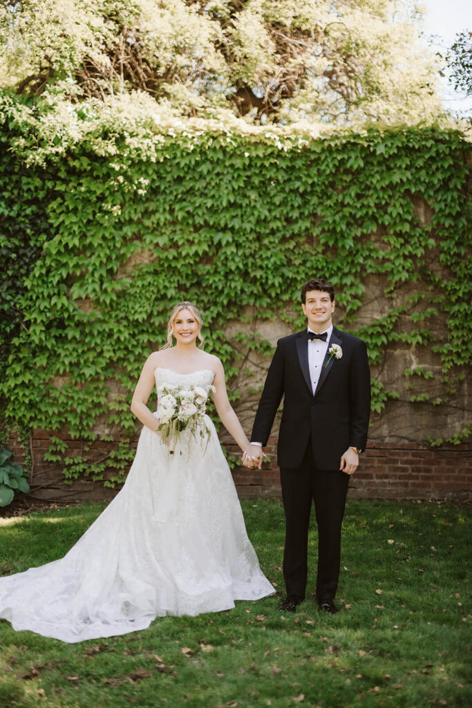 Bride and groom portraits along the grounds of the Mansion at Oyster Bay. Photo by OkCrowe Photography.