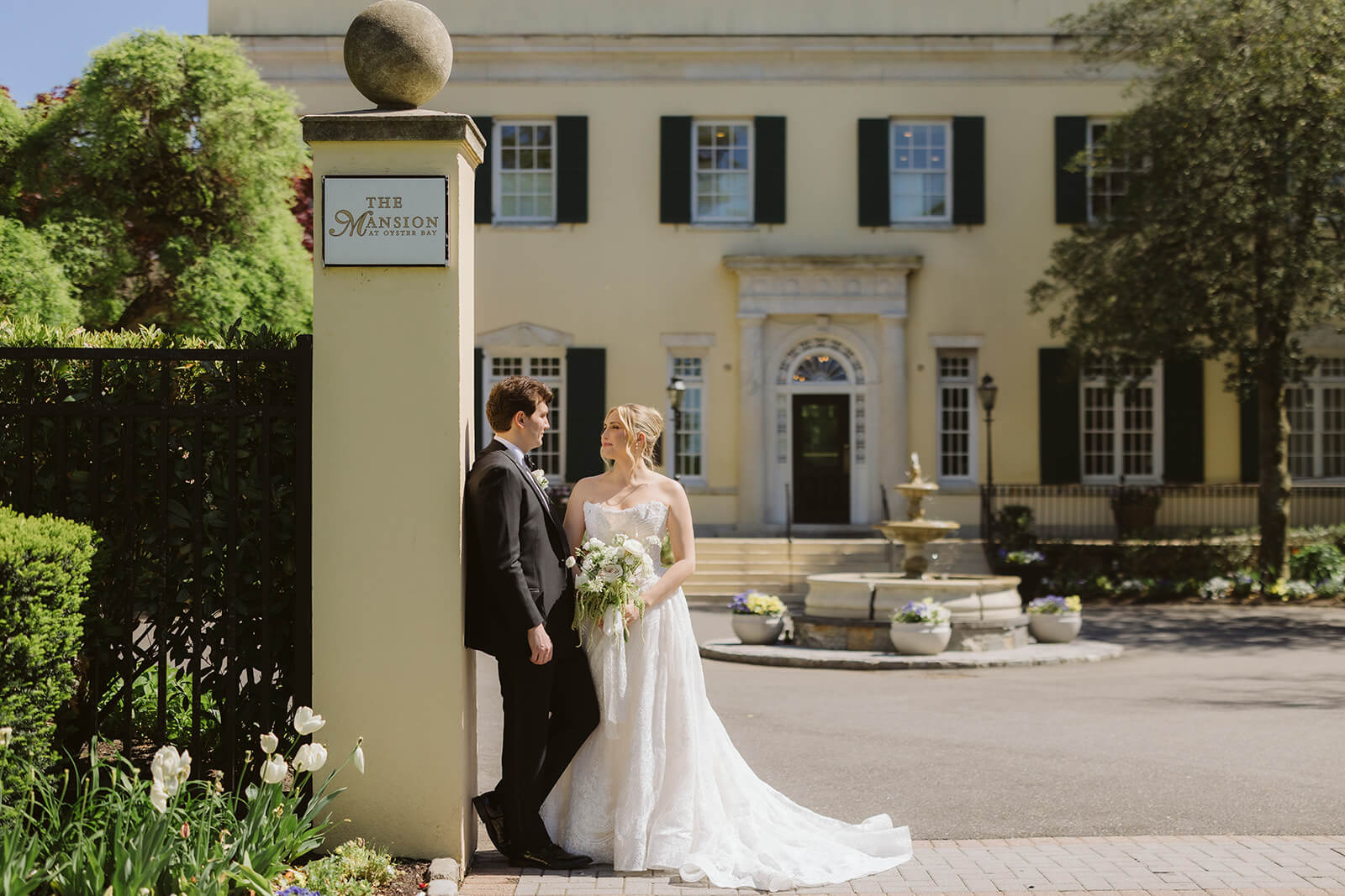 Bride and groom portraits along the grounds of the Mansion at Oyster Bay. Photo by OkCrowe Photography.
