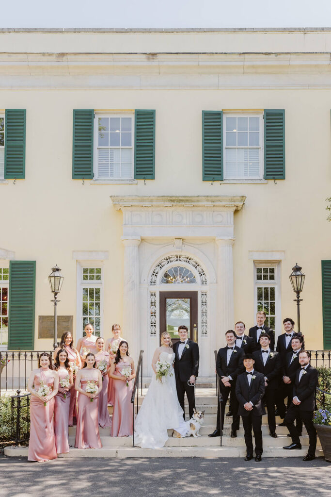 Wedding party portraits at the entrance to the Mansion at Oyster Bay. Photo by OkCrowe Photography.