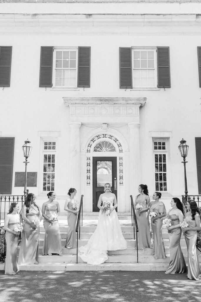 Wedding party portraits at the entrance to the Mansion at Oyster Bay. Photo by OkCrowe Photography.